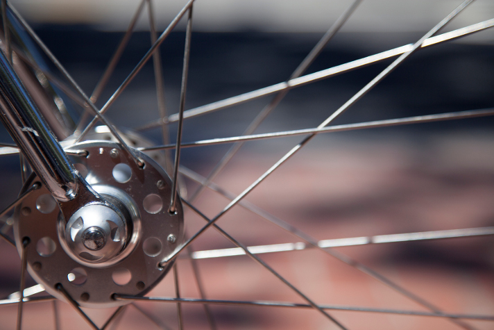 A track bike wheel secured by Pinhead Locking Axle Nuts